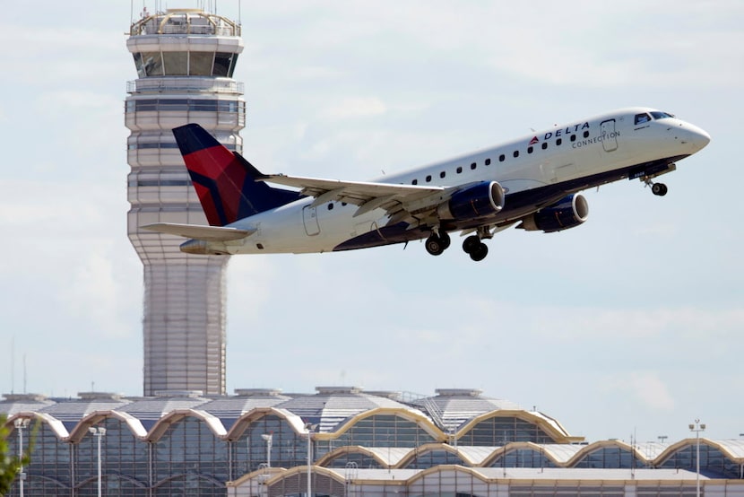  A Delta Air Lines jet takes off from Ronald Reagan Washington National Airport in...