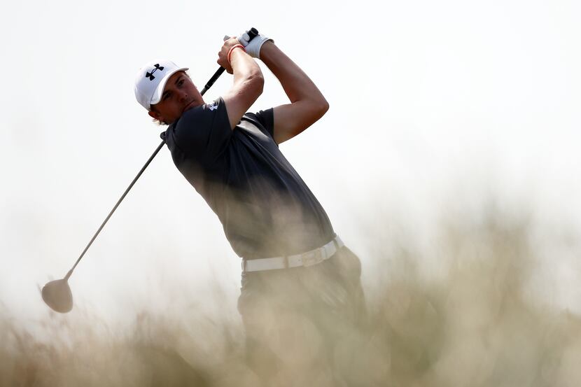 US golfer Jordan Spieth plays a shot on the fifth fairway during the third round of the 2013...