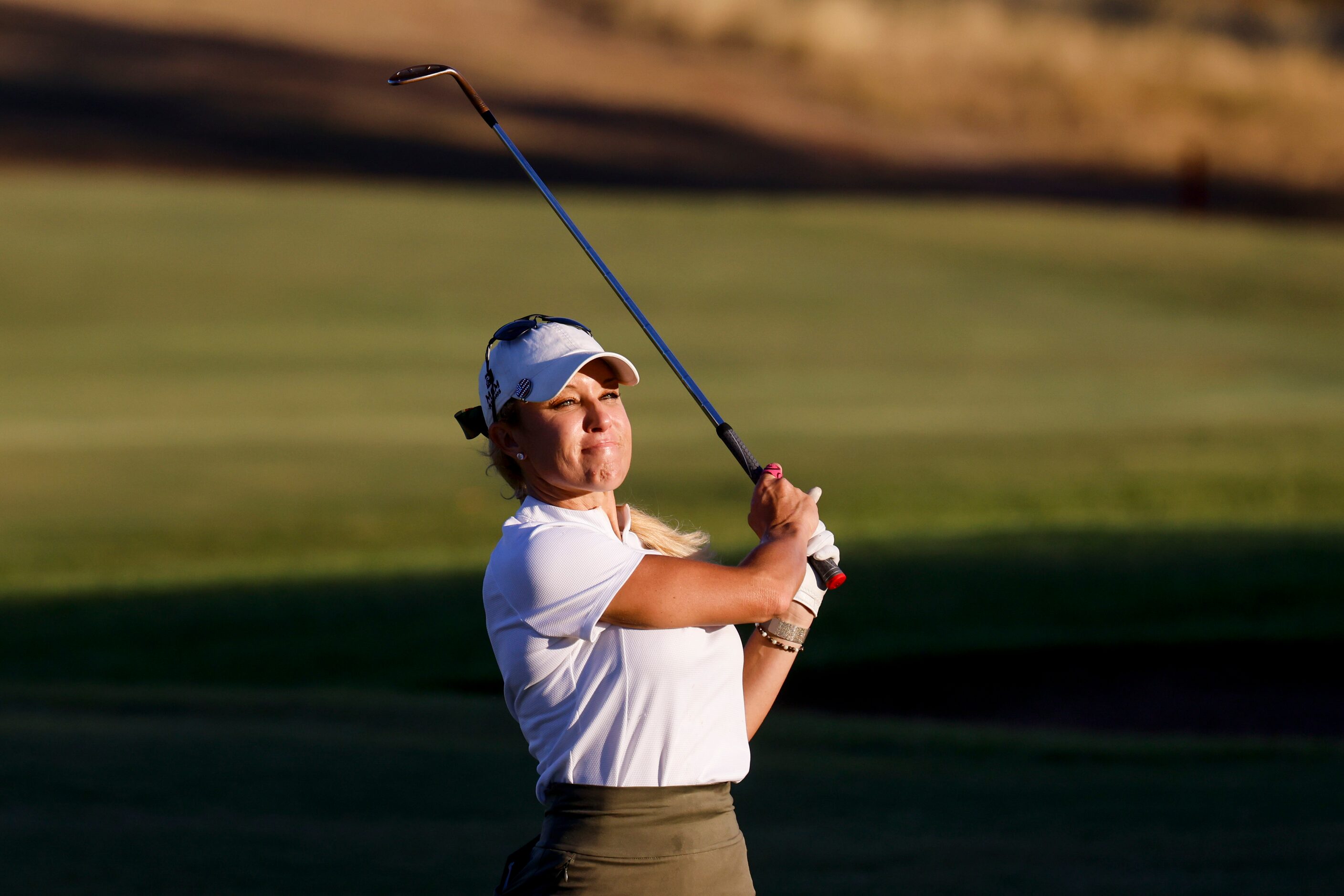 Natalie Gulbis of United States watches after hitting on the sixth fairway during the first...