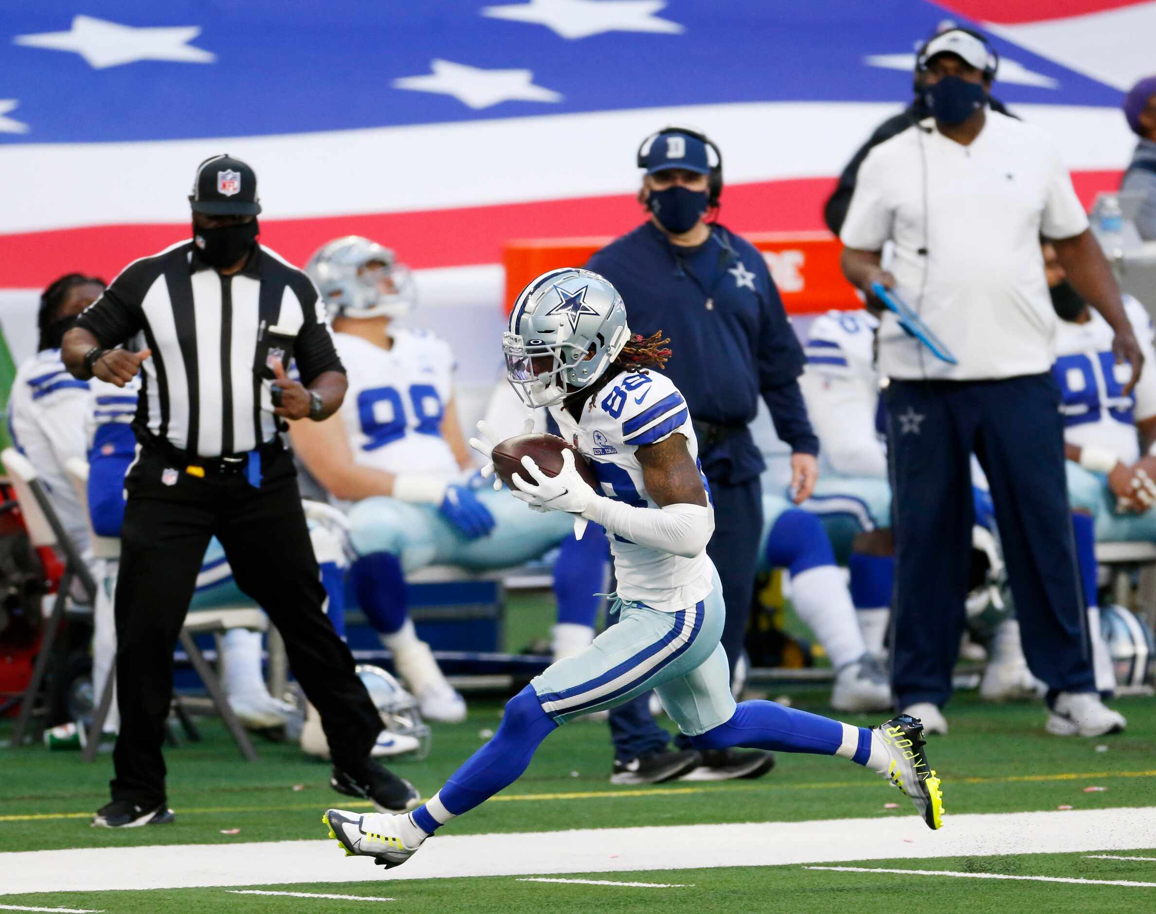 Dallas Cowboys wide receiver CeeDee Lamb (88) advances after the catch in a game against the...