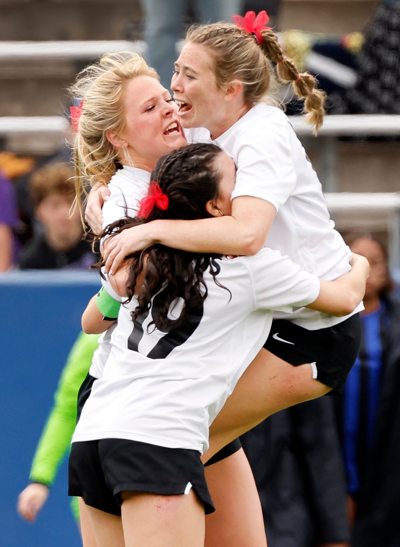 Flower Mound Marcus Chloe Adams (left) Carys Torgesen (19) and Allie Williams (right)...