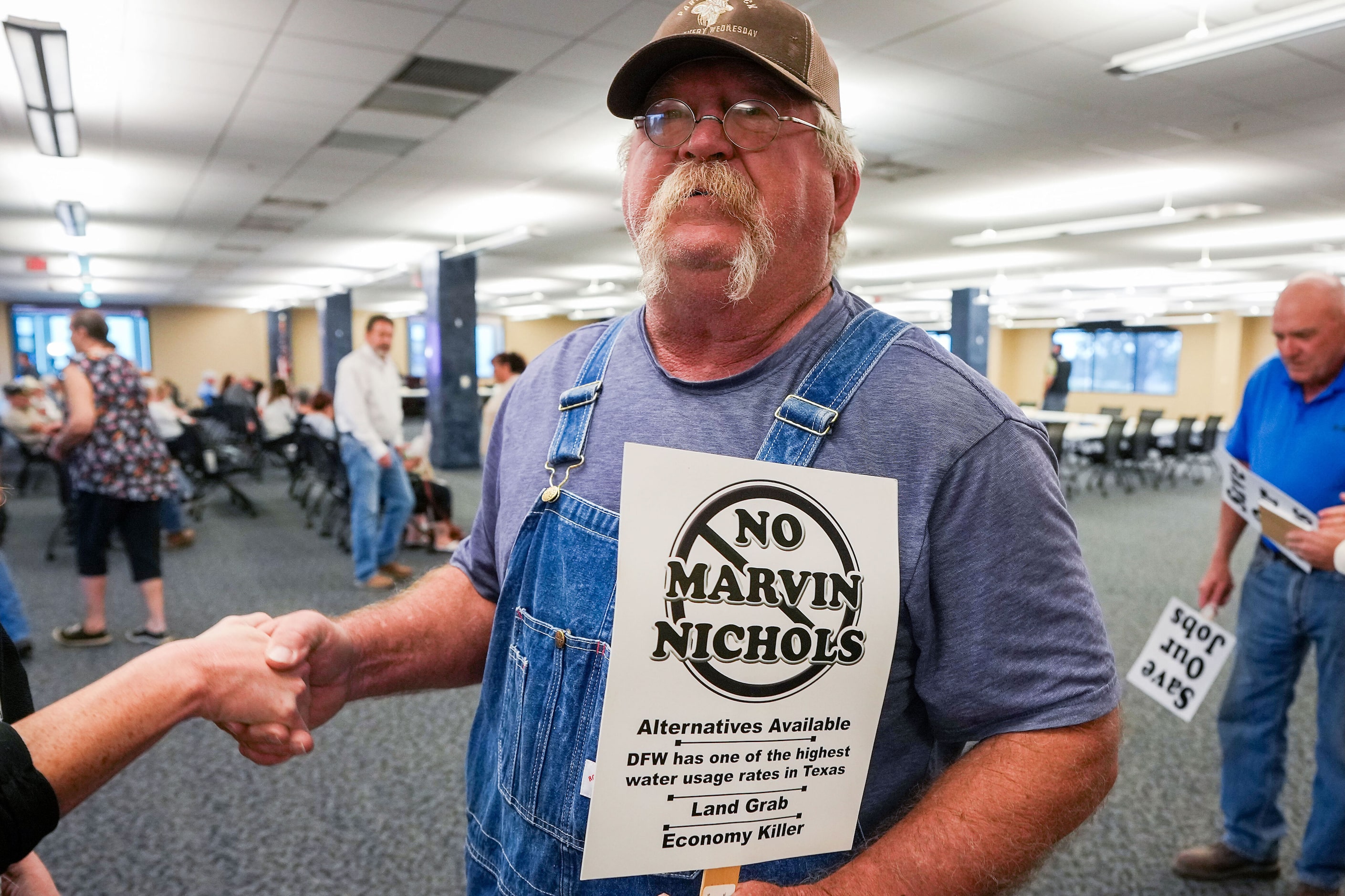 Landowner Eddie Belcher arrives for a meeting of the North East Texas Regional Water...