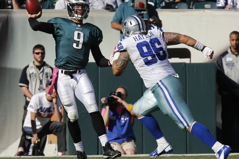 Dallas Cowboys defensive tackle Nick Hayden (96) rushes Philadelphia Eagles quarterback Nick...