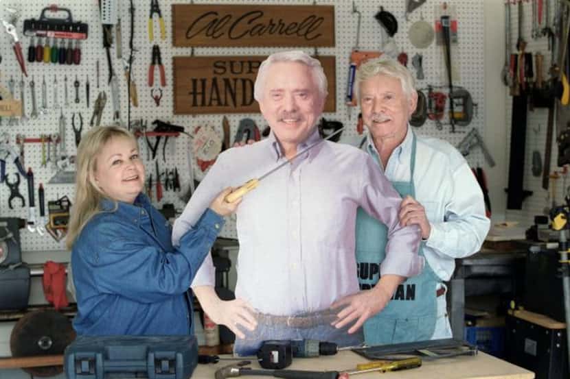 “Super Handyman” Al Carrell and his daughter Kelly Day joked around with a cutout of Carrell...
