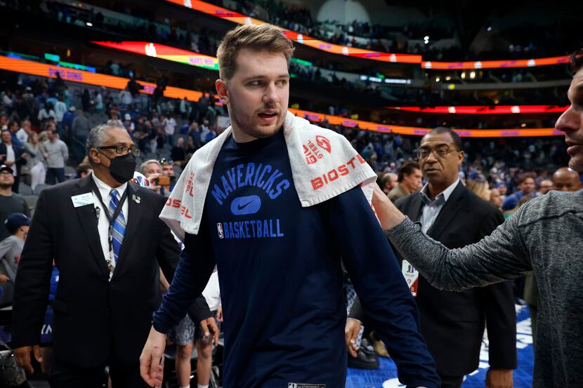 Dallas Mavericks guard Luka Doncic heads to the locker room after their big win over the...
