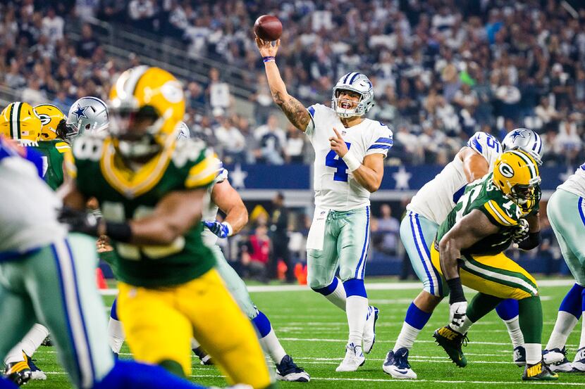 Dallas Cowboys quarterback Dak Prescott (4) throws a pass during the first half of an NFC...