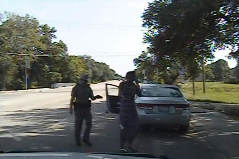 
In this frame from dashcam video provided by the Texas Department of Public Safety, trooper...