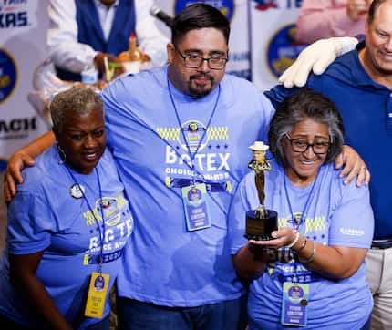 Denise Garza de la Cruz (right) holds the award for "most creative" at the State Fair 2022...