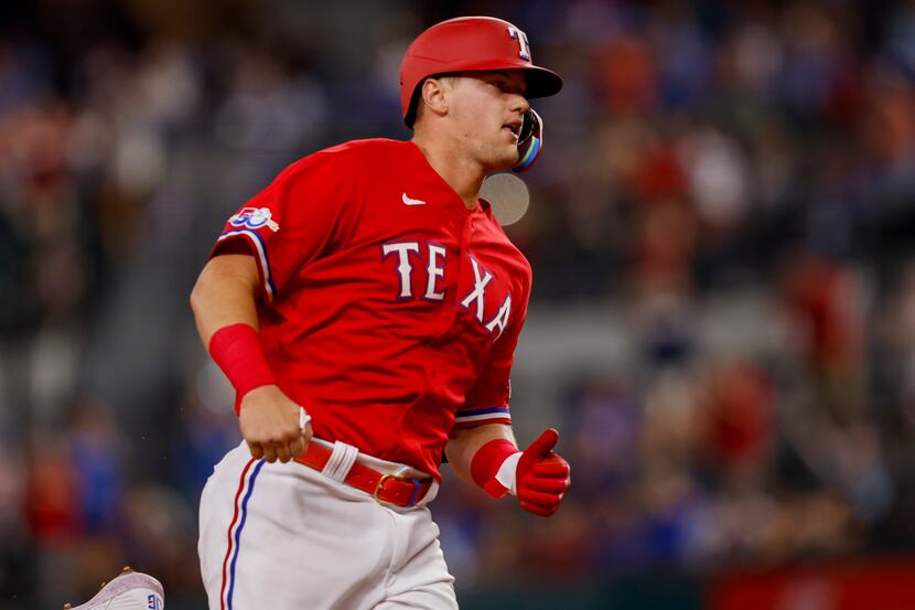 Texas Rangers third baseman Josh Jung (6) runs the bases after homering to left center as...
