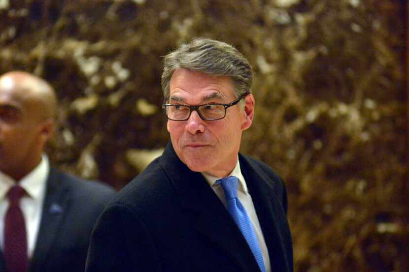 Former Texas Governor Rick Perry is seen in the lobby of Trump Tower on Dec. 12, 2016...