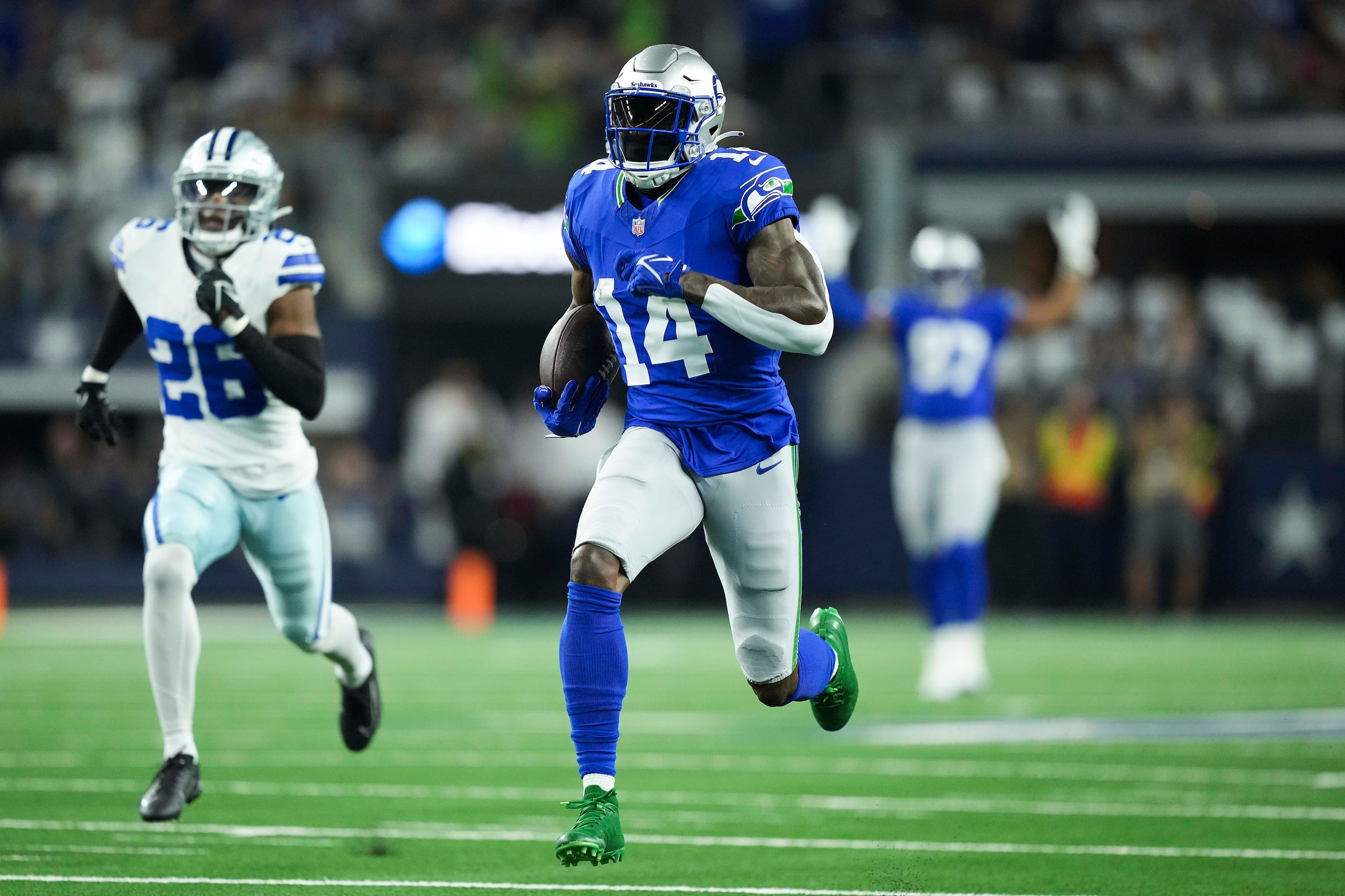 Seattle Seahawks wide receiver DK Metcalf (14) races for the end zone past Dallas Cowboys...