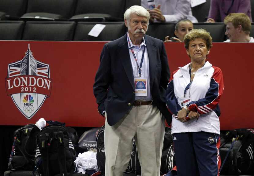 Bela and Martha Karolyi watched gymnasts warm up before the first round of the Women's...