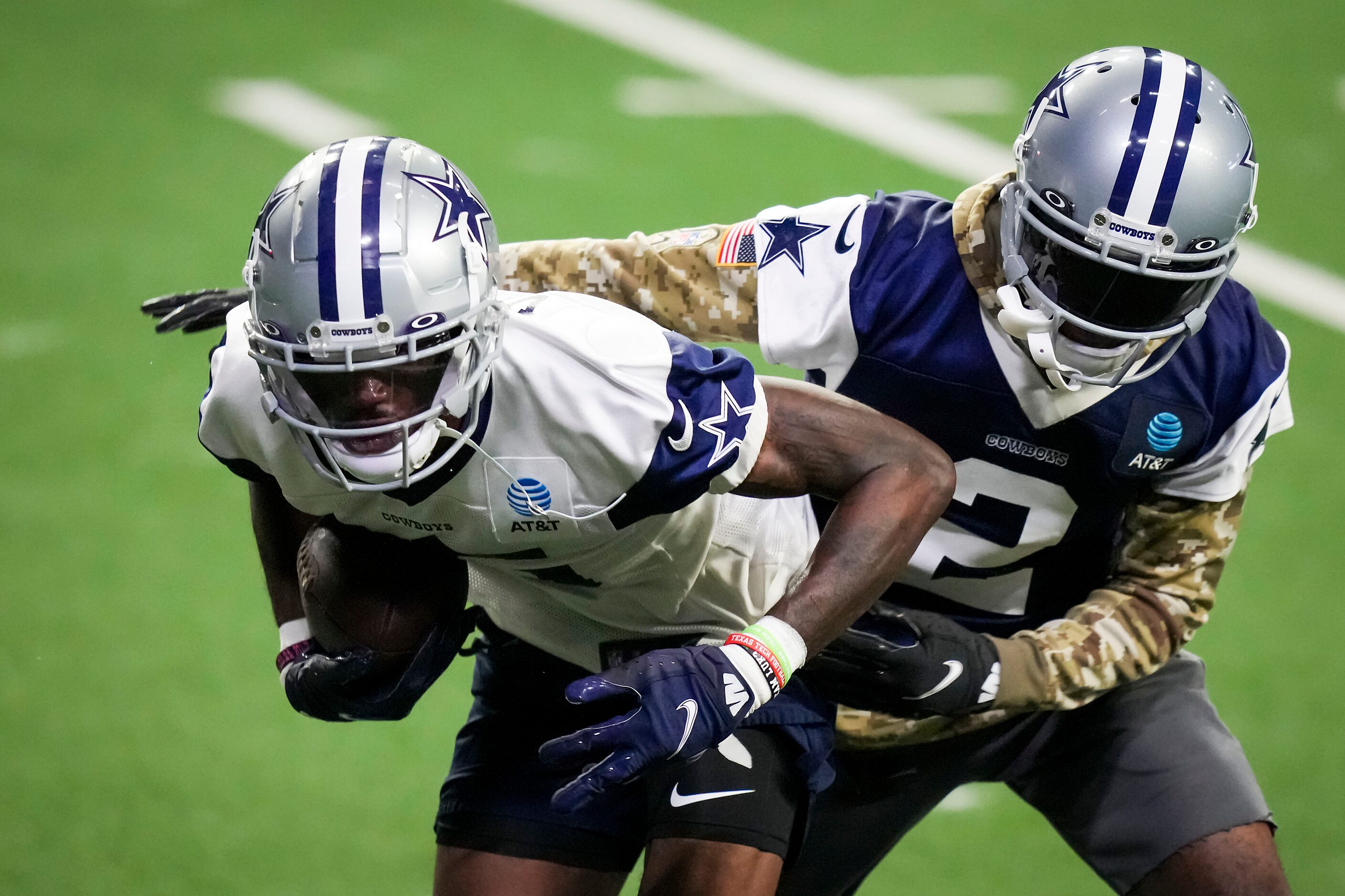 Dallas Cowboys wide receiver T.J. Vasher (16) makes a catch as cornerback Jourdan Lewis (2)...