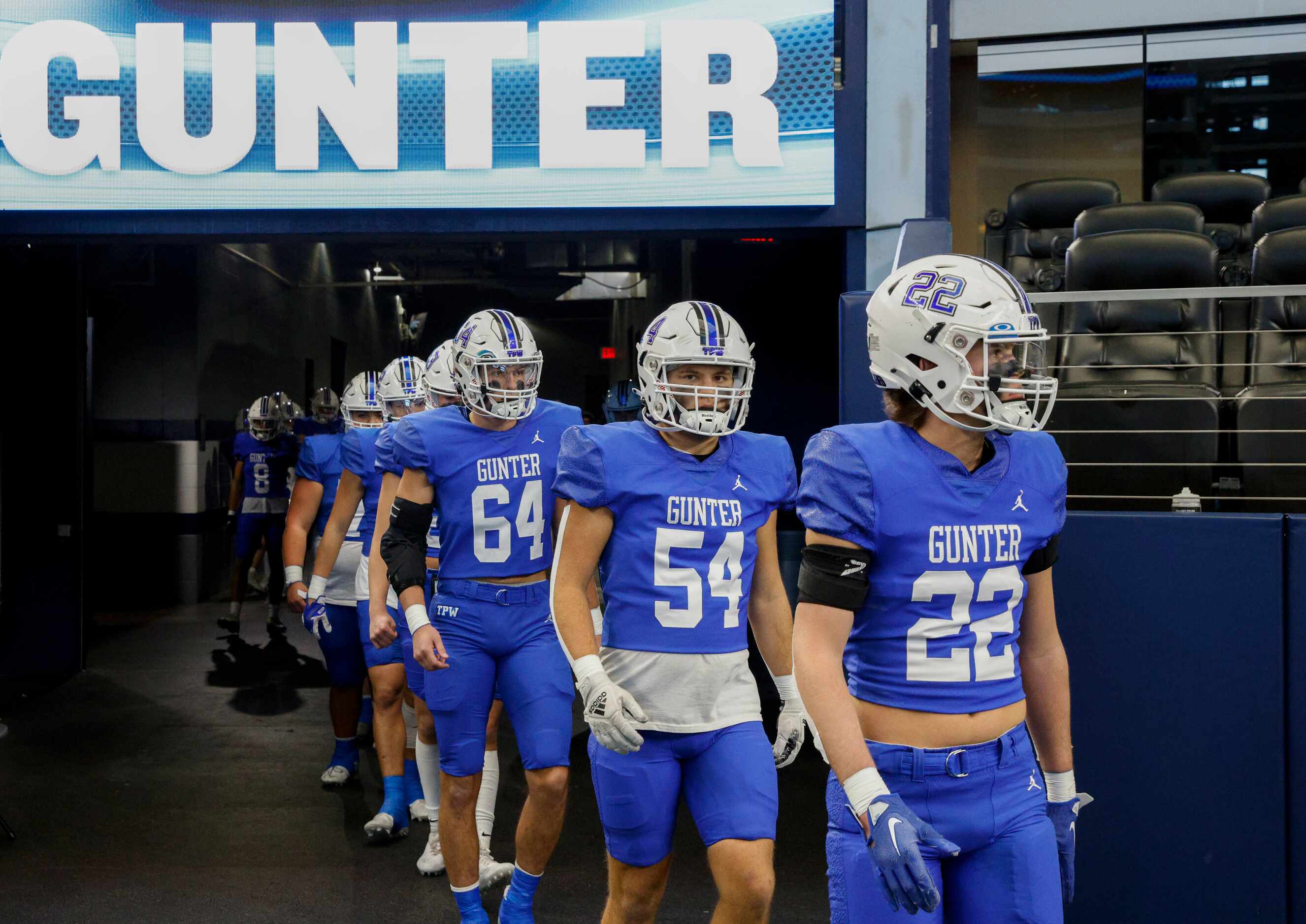 Gunter players take the field before the first half of the Class 3A Division II state...