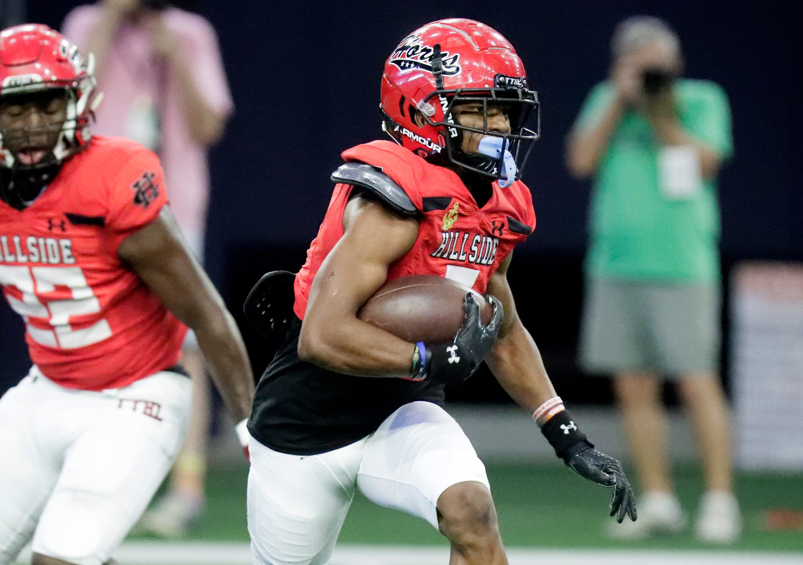 Cedar Hill High School kick returner A’vondric Rutherford (5) returns a kick during the...