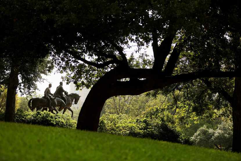 A view of the statue of Confederate Gen. Robert E. Lee at Robert E. Lee Park in the Oak Lawn...