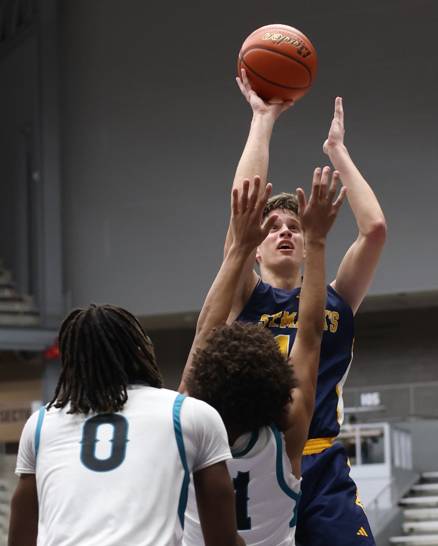 St. Mark's guard Luke Laczkowski (14) shoots a jump shot over the Frisco Panther Creek...