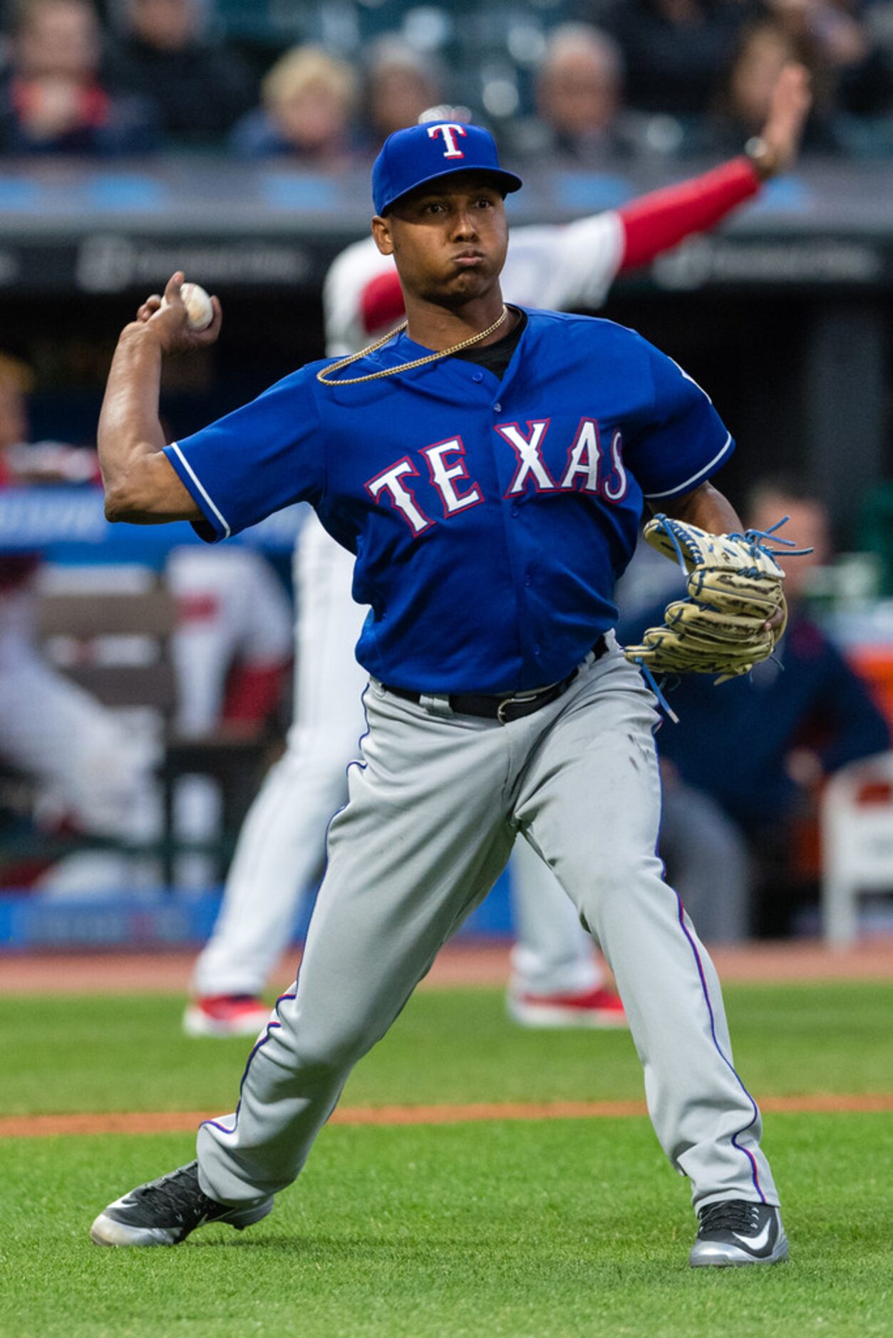 CLEVELAND, OH - APRIL 30: Jose Leclerc #62 of the Texas Rangers throws out Rajai Davis #26...