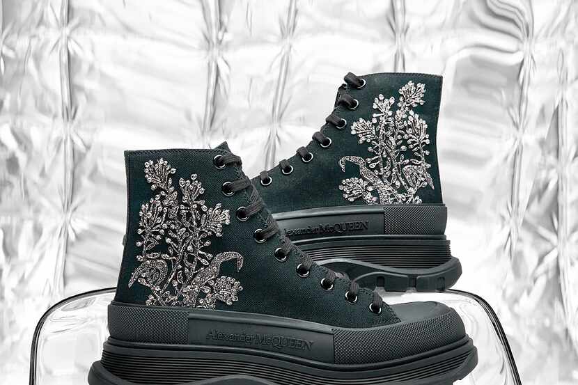 Alexander McQueen men's tread slick canvas embroidered boots are made in Italy and retail...