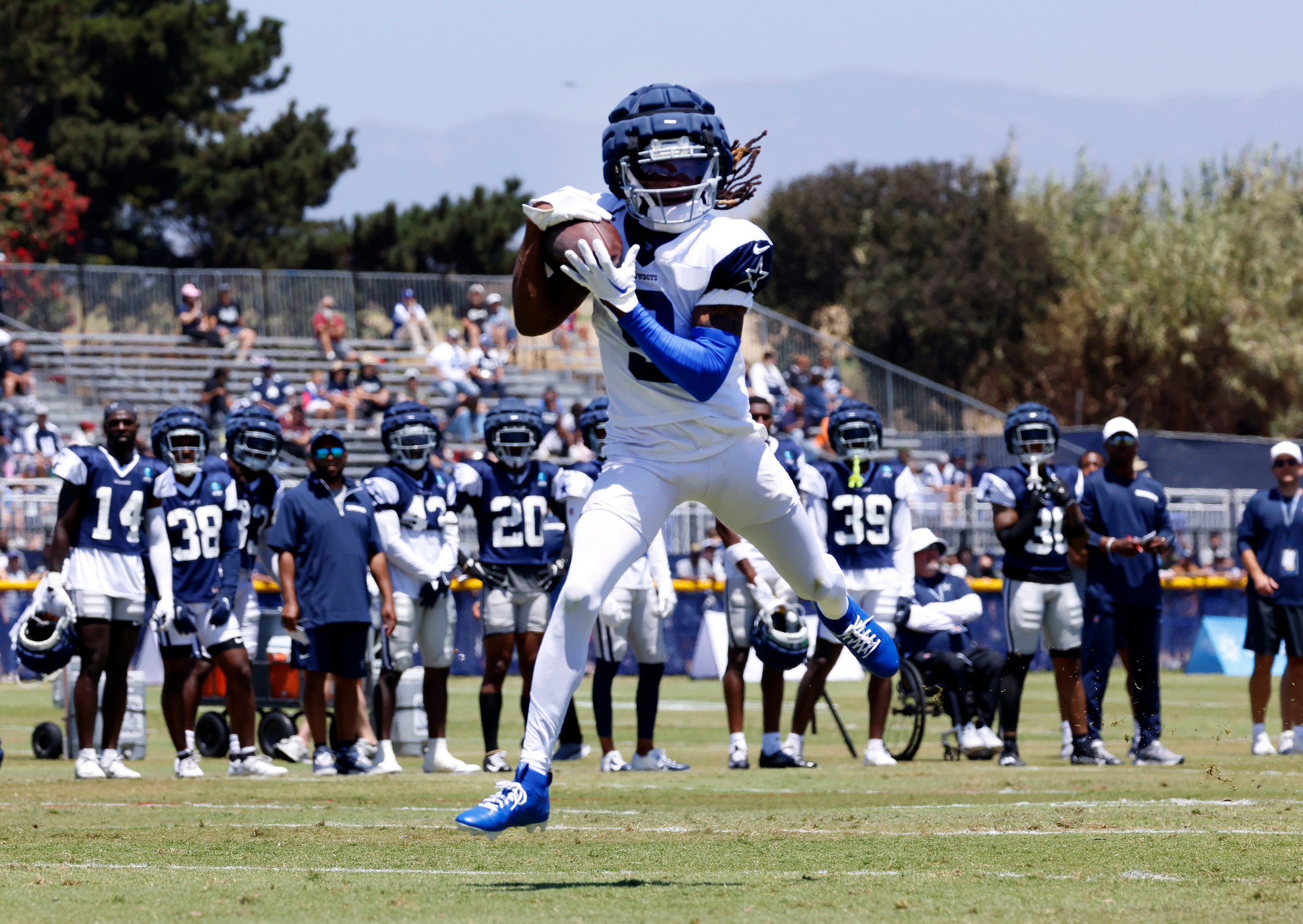 Dallas Cowboys wide receiver KaVontae Turpin (9) leaps and catches a touchdown pass during...