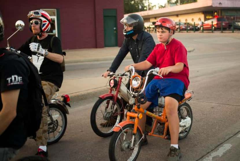 
Jack Graham, right, of Dallas, Texas is the youngest member of the Pine Box Pedal Club. He...