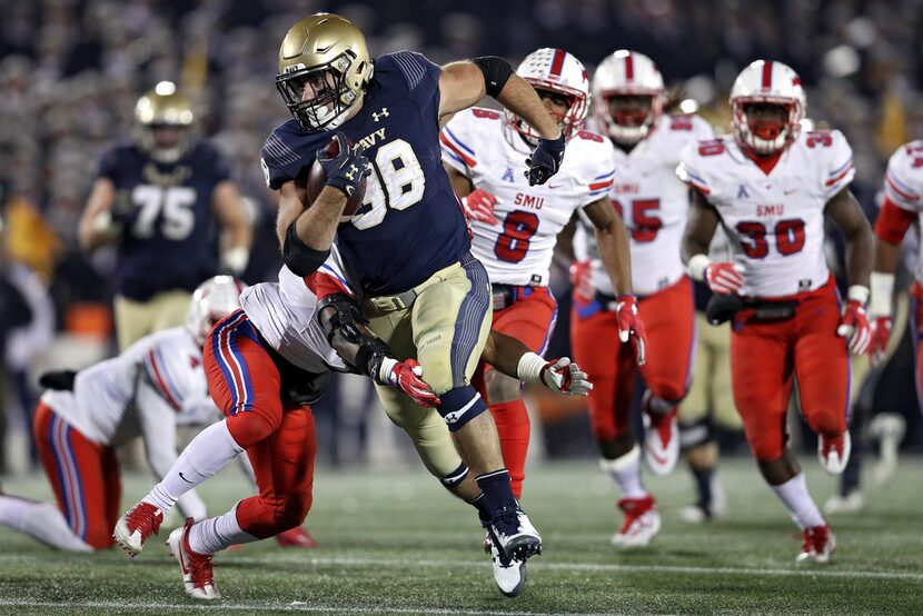 ANNAPOLIS, MD - NOVEMBER 11: Fullback Anthony Gargiulo #38 of the Navy Midshipmen rushes...