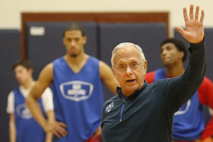SMU men's basketball coach Larry Brown works with his players at afternoon practice at SMU...