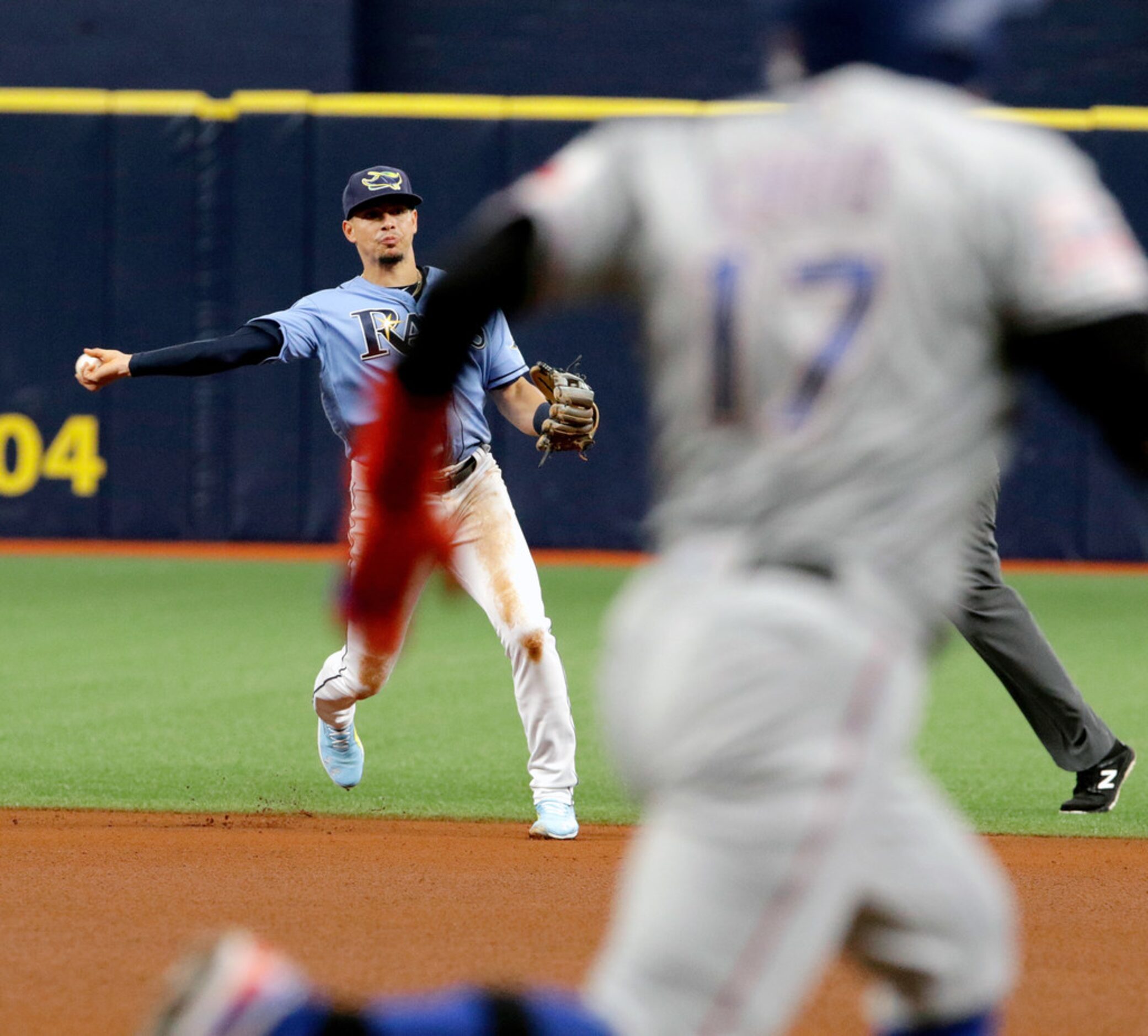 ST. PETERSBURG, FL - JUNE 30:  Willy Adames #1 of the Tampa Bay Rays throws out Asdrubal...