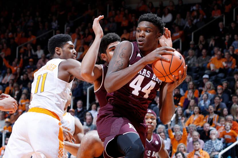 KNOXVILLE, TN - JANUARY 13: Robert Williams #44 of the Texas A&M Aggies rebounds against...