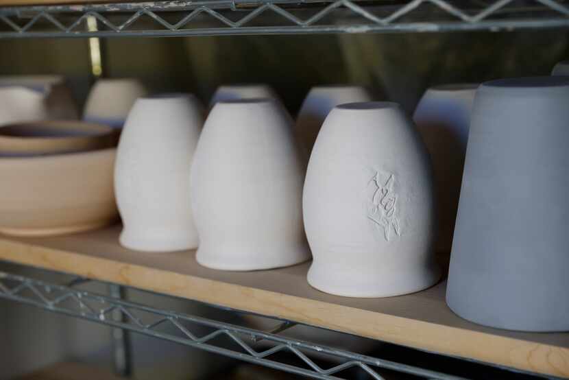 Artist Marcello Andres creates ceramic vases at his Dallas studio.