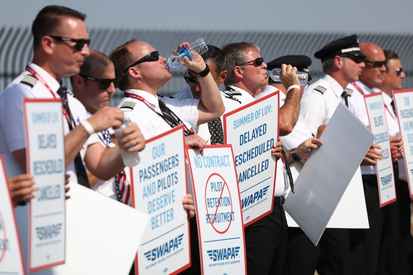 Southwest Airlines pilots picketed for better work conditions in June outside Dallas Love...