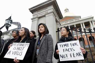 Jessica Wong, of Fall River, Mass., front left, Jenny Chiang, of Medford, Mass., center, and...