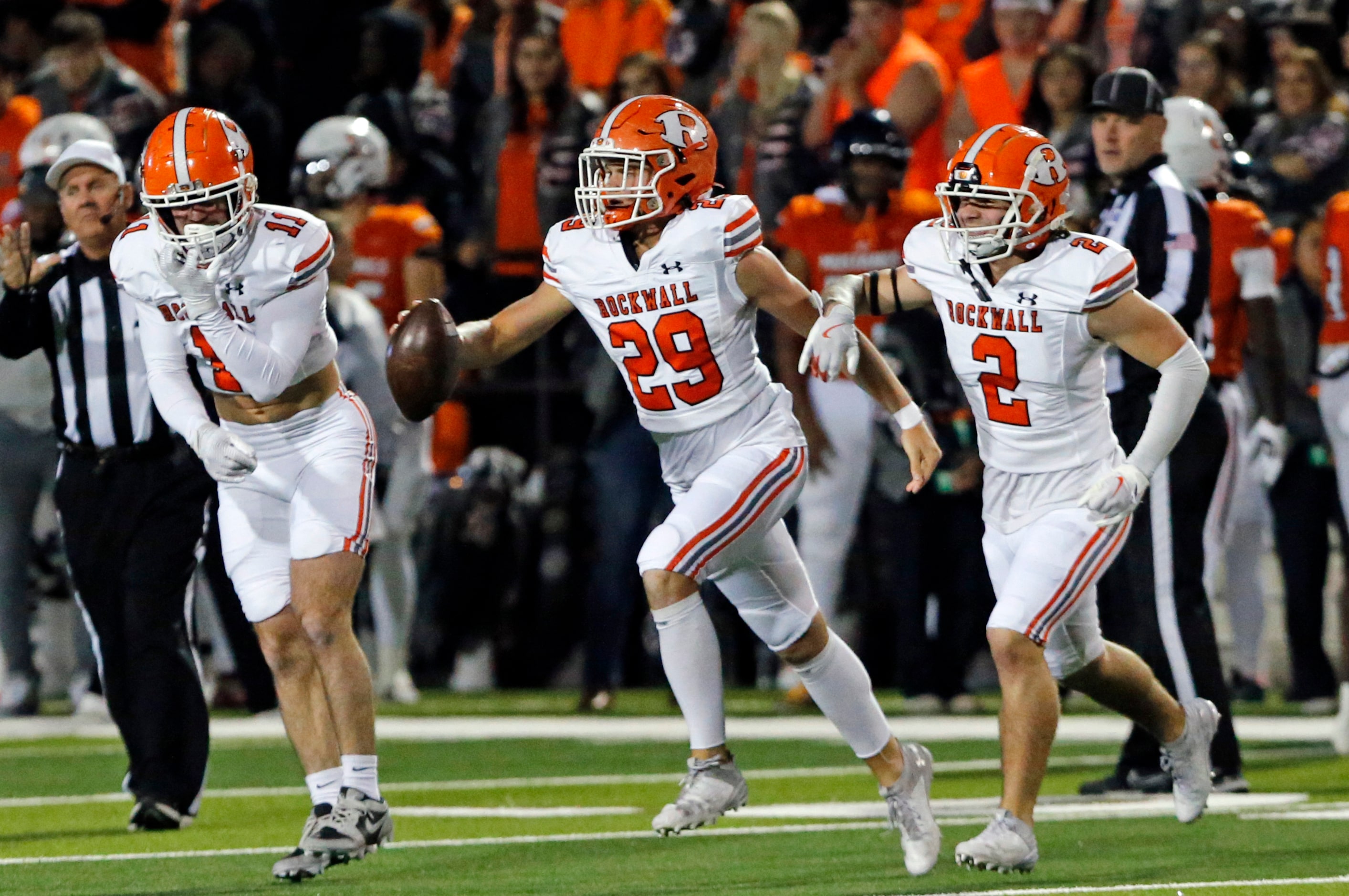 Rockwall High’s Anderson Stephens (29) celebrate after the team recovered an on-side-kick...