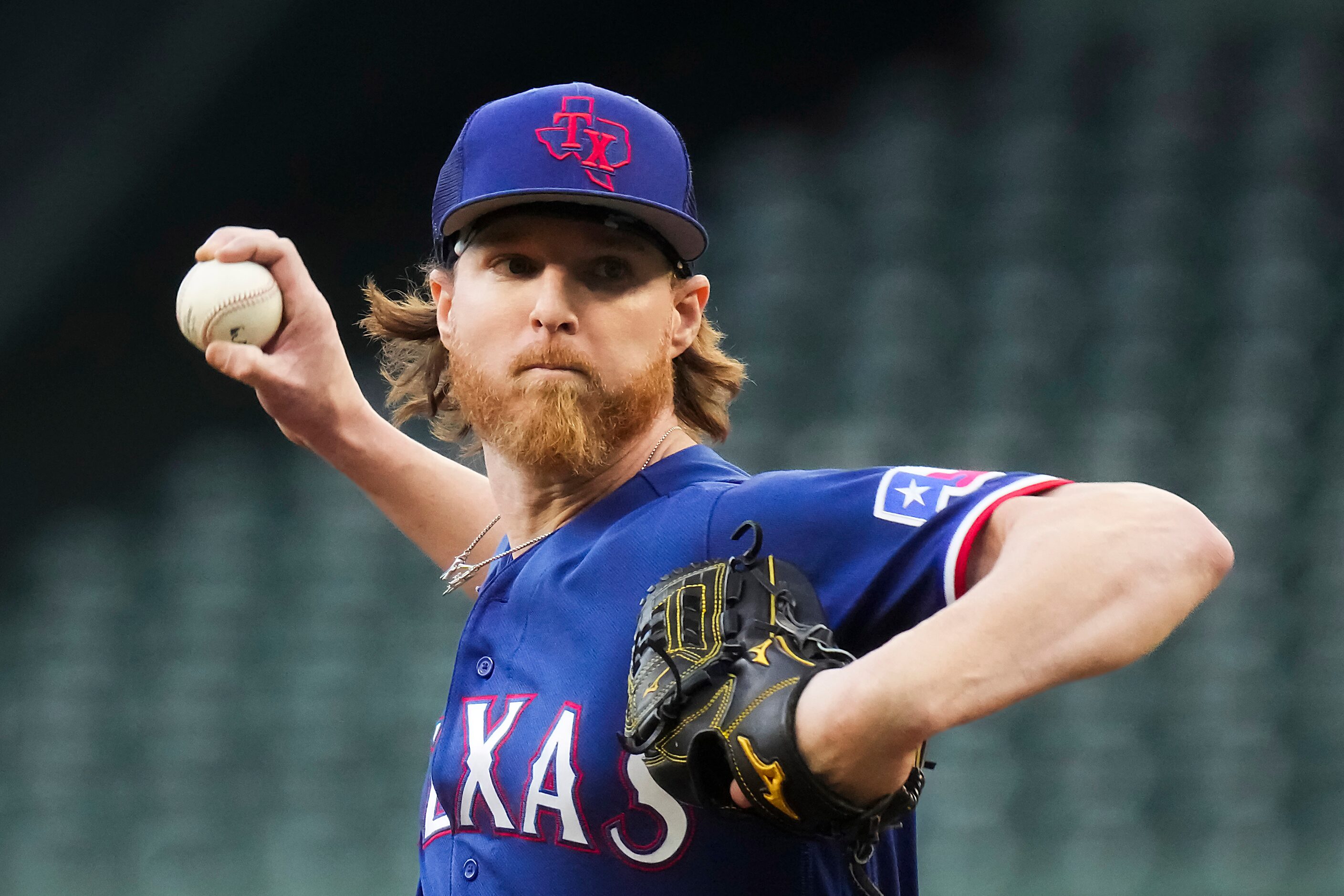 Texas Rangers pitcher Jon Gray throws a simulated game during a workout in preparation for...