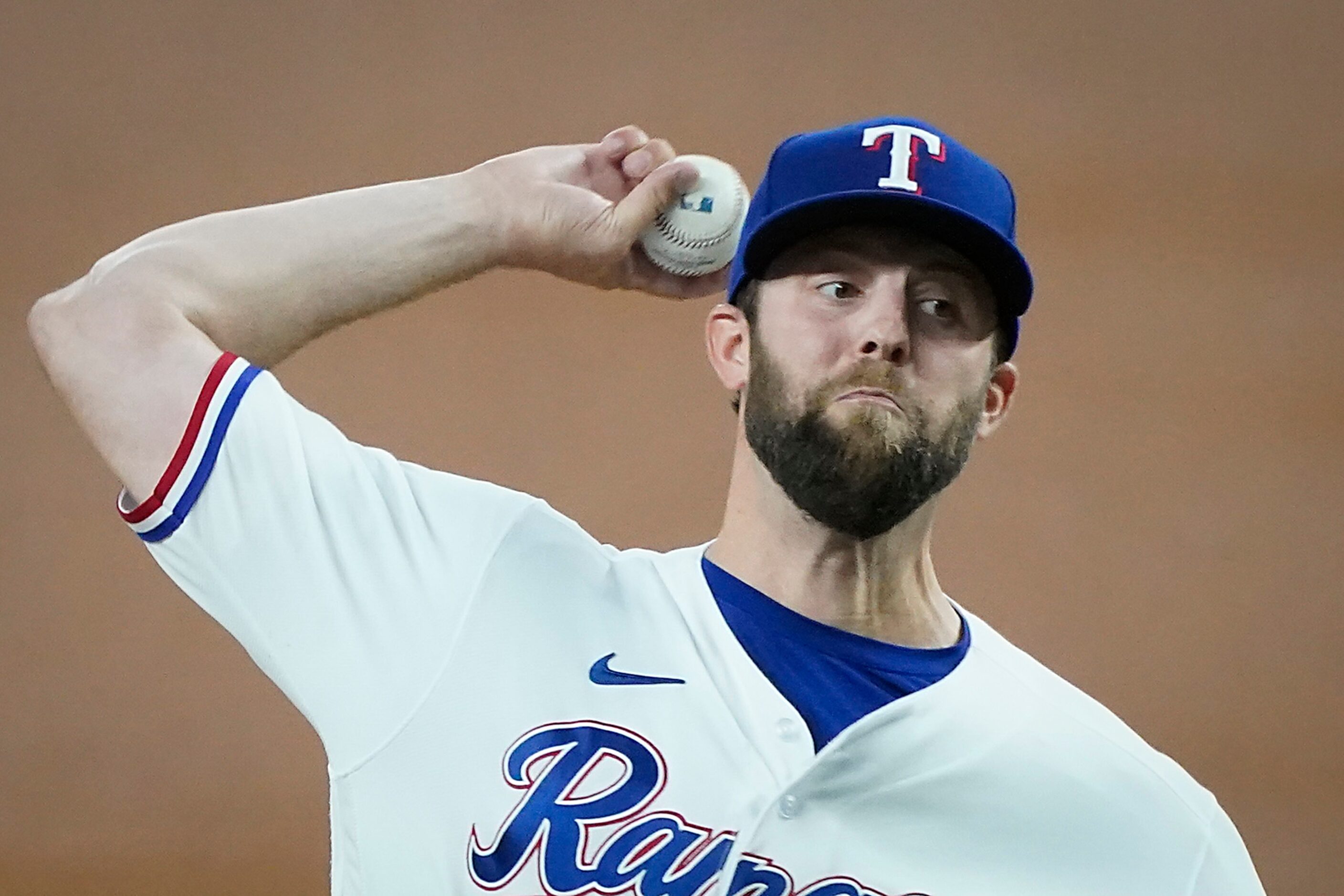 Texas Rangers starting pitcher Jordan Lyles delivers during the first inning against the...