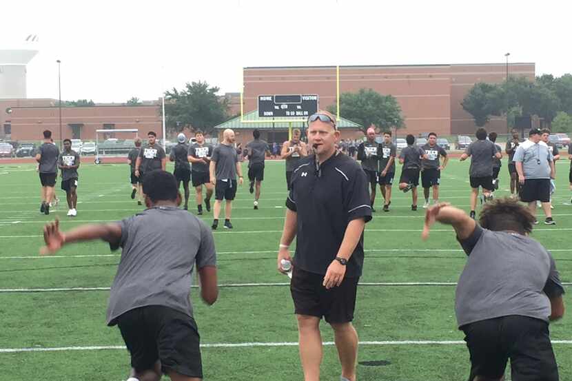 Mansfield football coach Daniel Maberry coaches on the first day of practice on Monday, Aug....