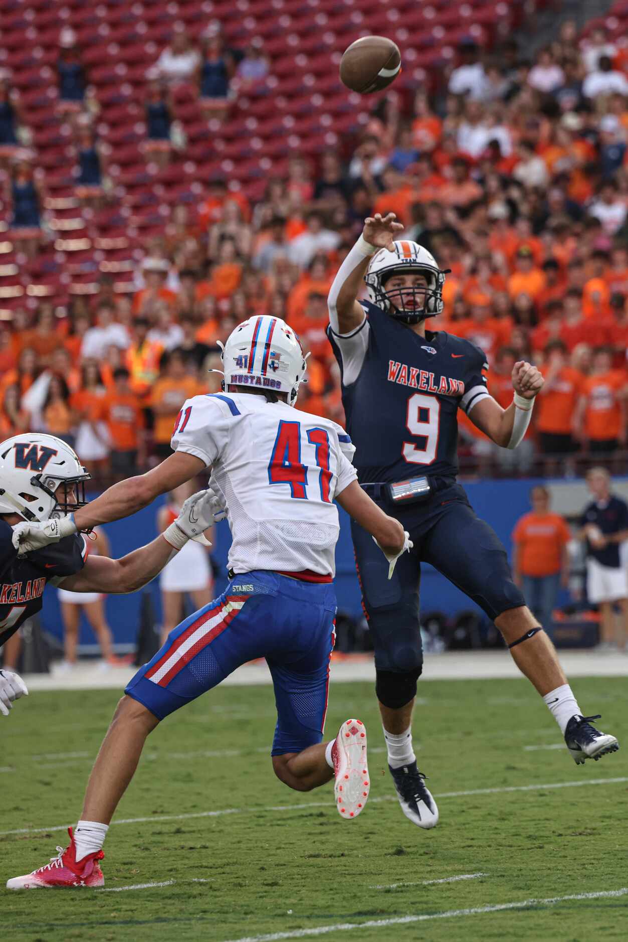 Wakeland High School’s Quarterback Brennan Myer throws a pass during the first quarter of...