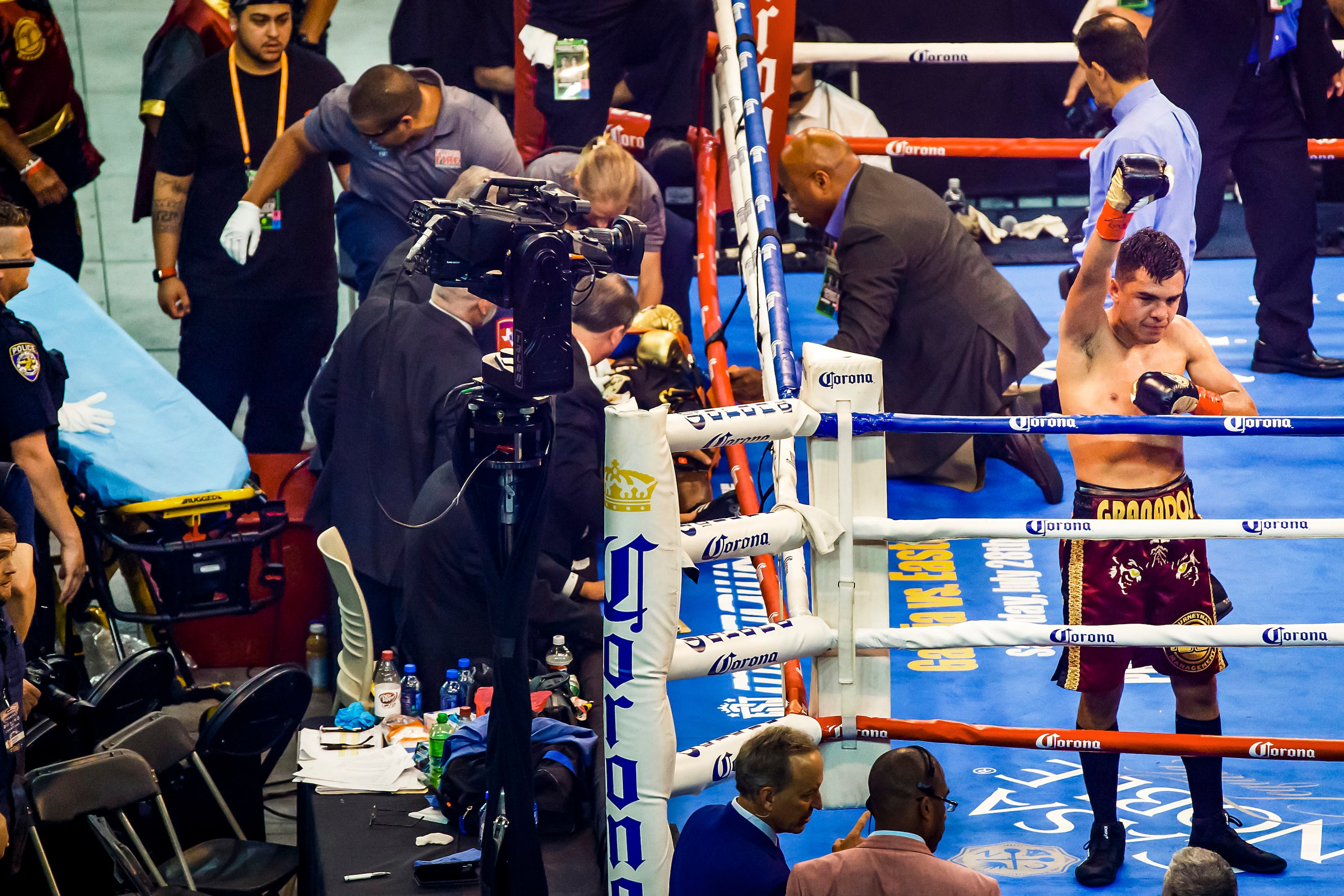 Adrian Granados, of Chicago, Illinois, celebrates after his opponent Javier Fortuna (left),...