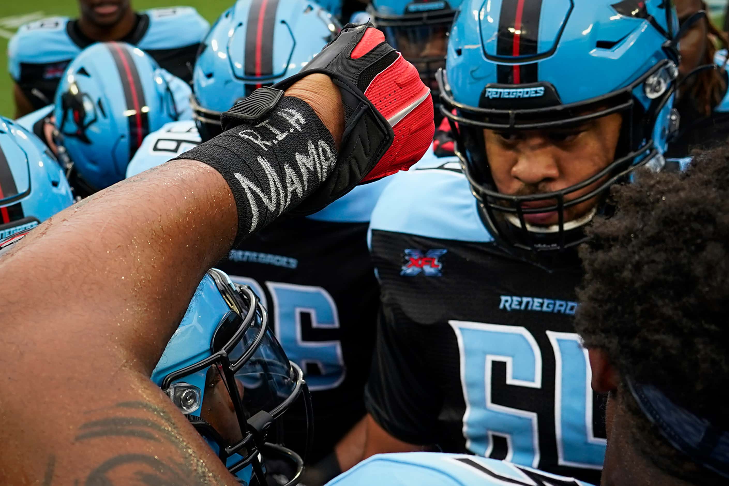Dallas Renegades defensive end Frank Alexander has ÔRIP MamaÕ written on his taped wrist as...