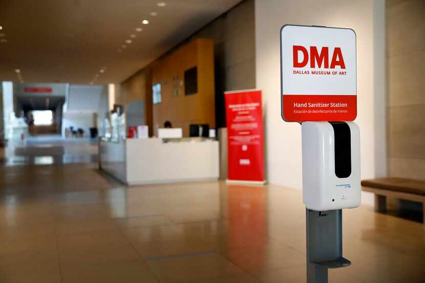 A hand sanitizer station appears at the entrance of The Dallas Museum of Art on Friday, Aug....