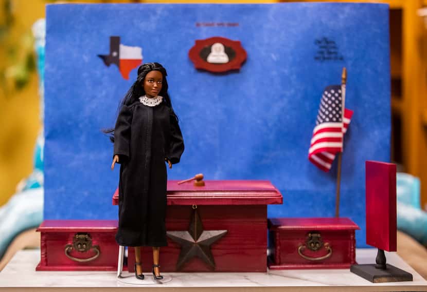 A Judge Barbie doll stands in a model courtroom created by Dallas County Criminal Court...