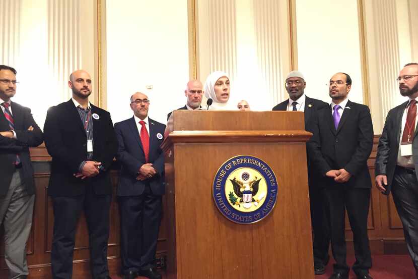  Alia Salem (at podium), executive director of the DFW chapter of the Council on...