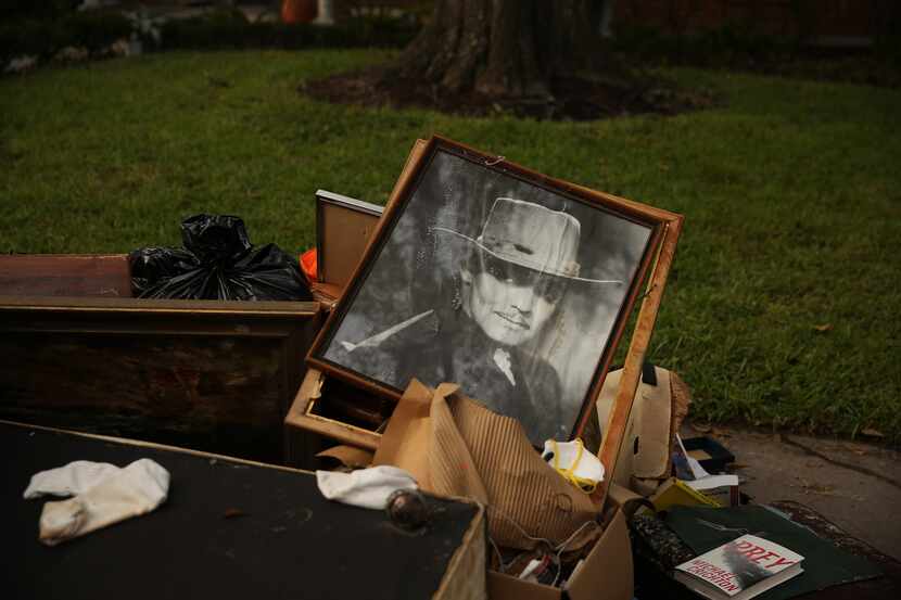 Residents had to trash framed photos of actors and reprints of famous paintings. One family...