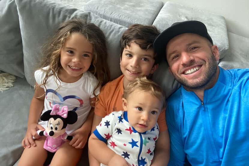 Mavs guard J.J. Barea poses for a selfie with his children, 8-year-old Sebastian, 4-year-old...