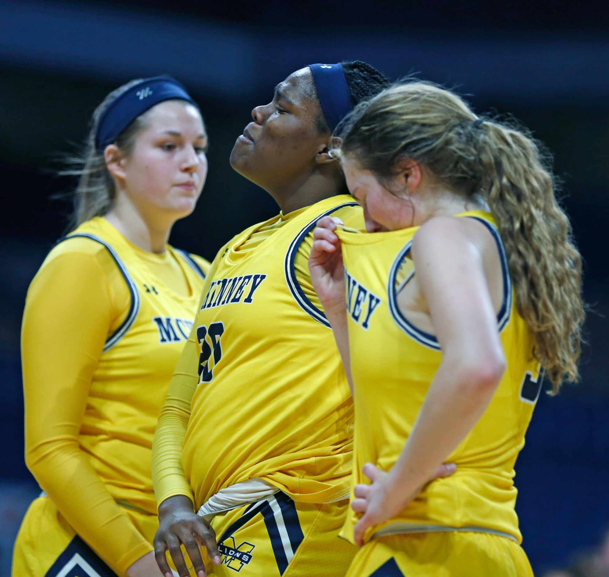 McKinney player walk off court at the end of the game in 6A semifinal: Cypress Creek vs....