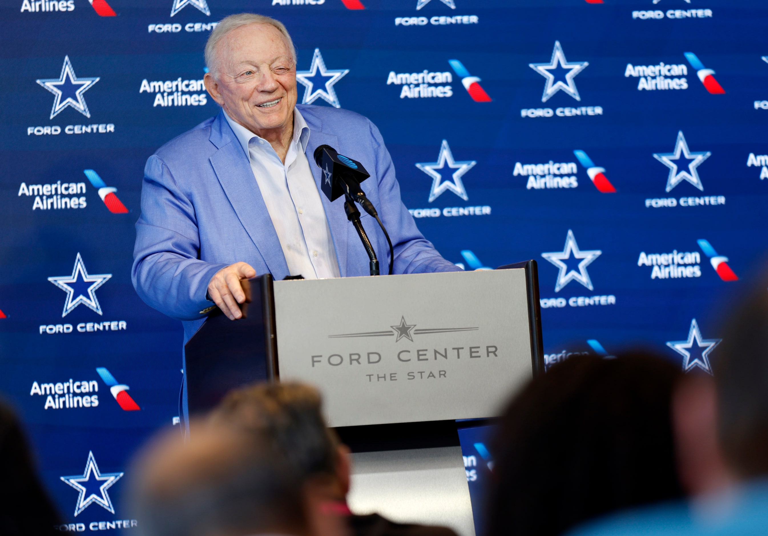 Dallas Cowboys owner Jerry Jones gives a little wink as he answers questions from the media...