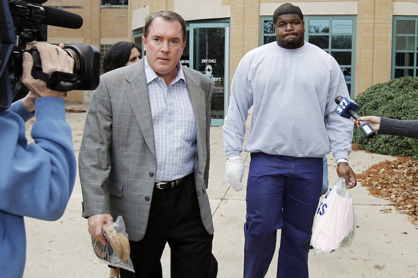 Josh Brent, escorted by his attorney George Milner (left), was released from the Irving...