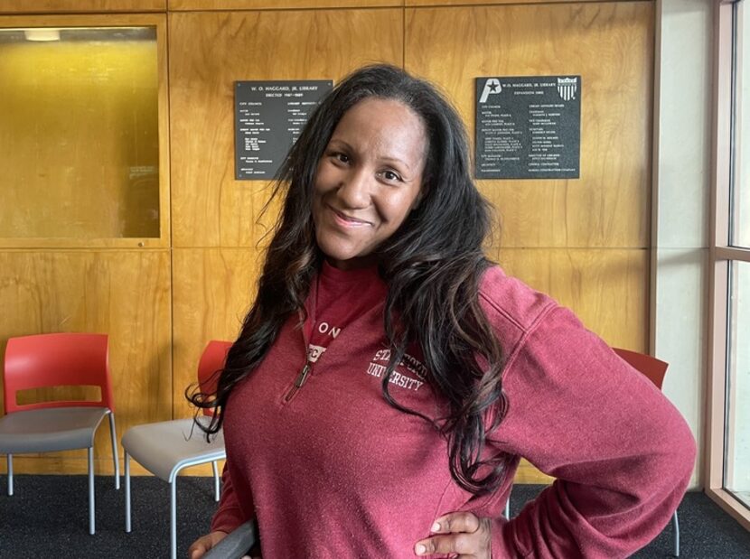 Karith Foster waited in line at the Haggard Library in Plano to vote in the primary election...