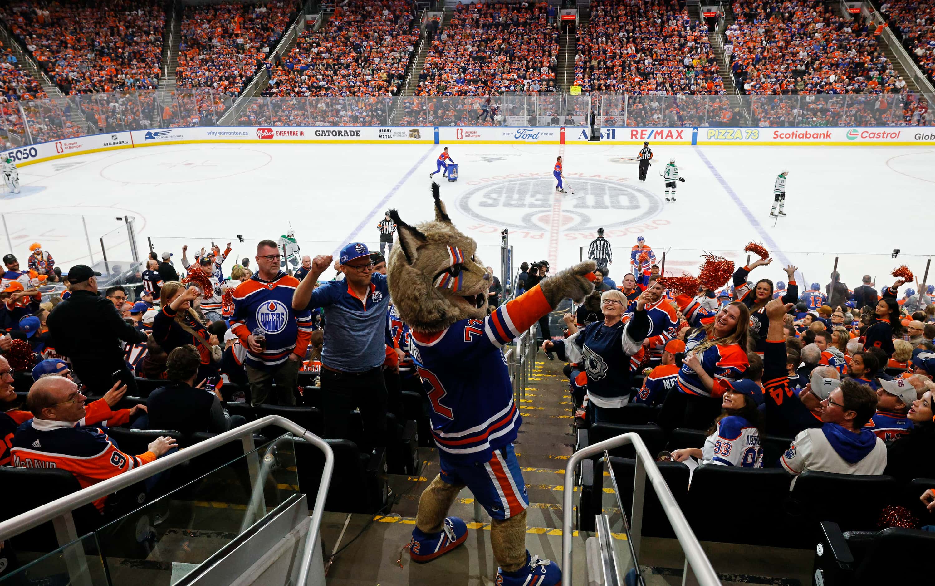 Edmonton Oilers mascot "Hunter the Lynx" cheers in the third period during Game 4 of the NHL...
