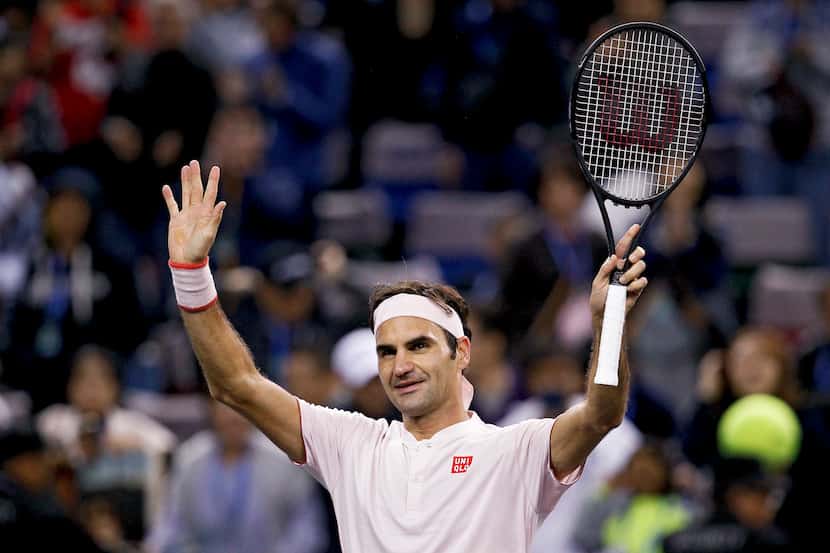 FILE - Roger Federer of Switzerland waves to spectators after defeating Daniil Medvedev of...